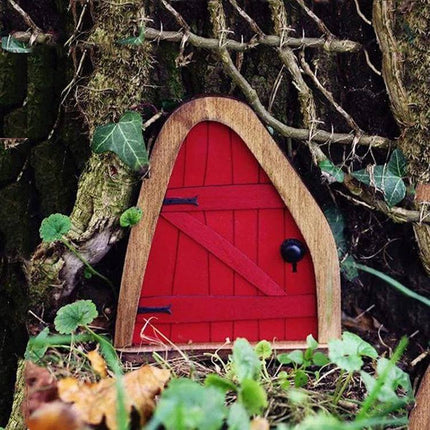 Courtyard Wooden Miniature Fairy Door For Garden Decor - red miniature wooden fairy door placed at base of tree for whimsical garden decor