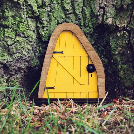 Courtyard Wooden Miniature Fairy Door For Garden Decor - yellow miniature wooden fairy door placed at tree base for whimsical garden or terrarium display