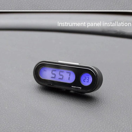Car Dashboard Clock with Temperature for Daily Drives on black car dashboard showing digital time 5:57 and 23°C thermometer