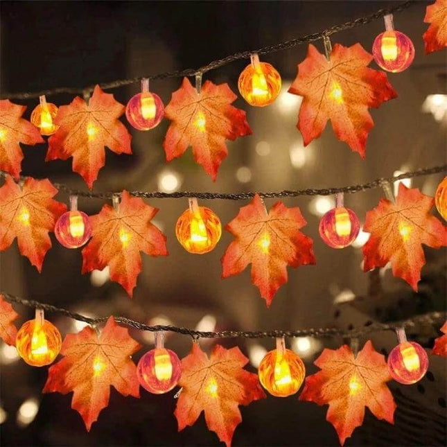 Maple Pumpkin Lantern String Lights For Halloween Decor - battery-powered maple leaf and pumpkin LED string lights creating warm fall mantel ambiance