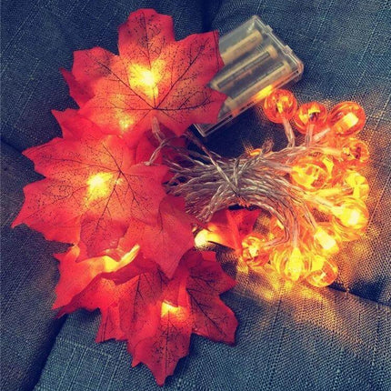 Maple Pumpkin Lantern String Lights For Halloween Decor glowing maple leaf LED string lights on battery pack for fall mantel and table