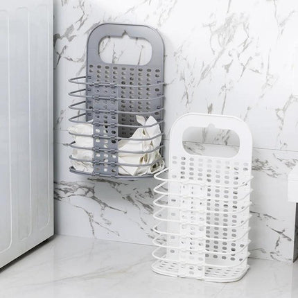 Folding Basket for Bathroom Laundry and Toy Storage — collapsible perforated wall or floor basket holding towels and bath toys in marble bathroom
