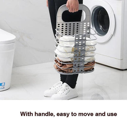 Folding Basket for Bathroom Laundry and Toy Storage held by handle beside washing machine, collapsible organizer for clothes and bath toys