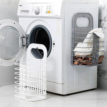 Folding Basket for Bathroom Laundry and Toy Storage placed next to washing machine for organizing clothes and bath toys