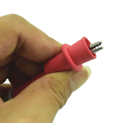 10 Pairs Universal Alligator Clips for Multimeter Testing - close-up red insulated clip held by hand for secure multimeter connections