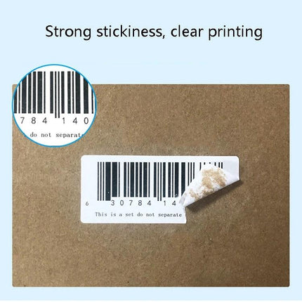 Waterproof Thermal Paper Barcode Stickers for Shipping Labels showing strong stickiness and clear barcode printing on a kraft box