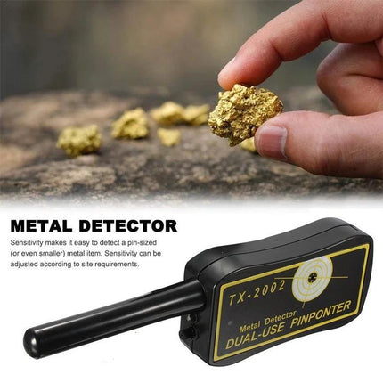 Compact Hand-Held Metal Detector for Outdoor Treasure Searches - handheld TX-2002 pinpointer detecting gold nuggets on rocky ground