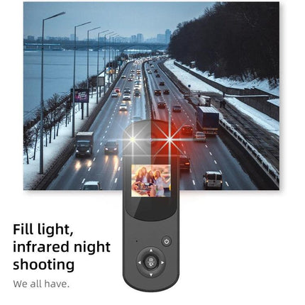 Multi-Function Digital Video Camera for Sports and Recording Sessions showing compact camera with fill light recording snowy highway traffic at night