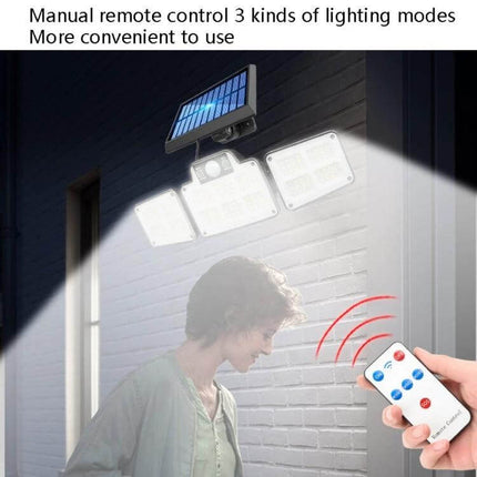 Solar Motion Sensor Courtyard Light for Outdoor Pathway mounted with remote control showing bright motion-activated illumination over doorway