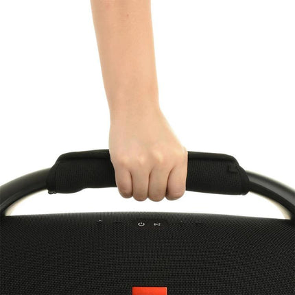 JBL Boombox Carry Strap With Padded Grip For Everyday Outdoor Use shown on speaker handle for easy transport