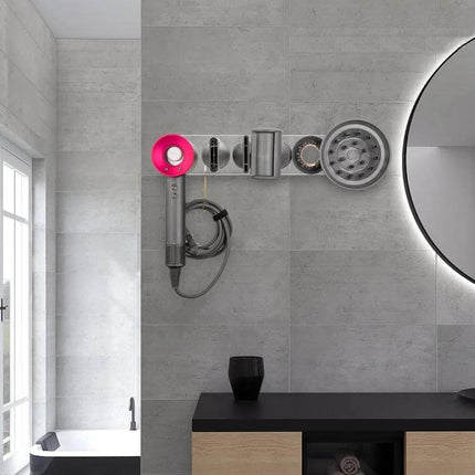 Punch Free Acrylic Hair Dryer Wall Bracket For Dyson mounted in modern bathroom holding Dyson dryer and attachments, slim hole-free acrylic magnetic rack