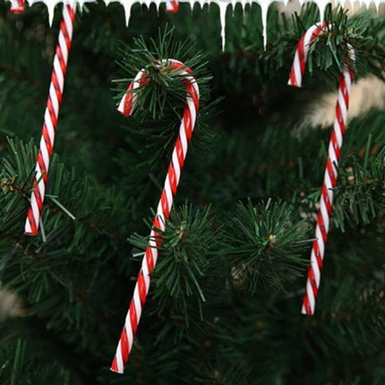 Candy Cane Christmas Ornaments 6 Pack For Tree Decor - six lightweight red and white plastic candy cane ornaments hanging on green Christmas tree