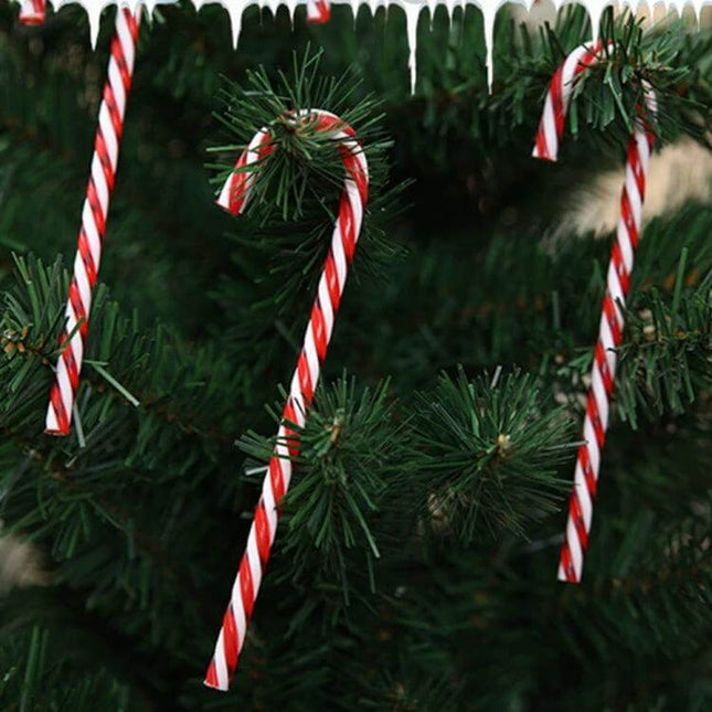 Candy Cane Christmas Ornaments 6 Pack For Tree Decor - six lightweight red and white plastic candy cane ornaments hanging on green Christmas tree