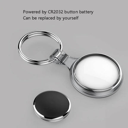 Keychain Tracker for Locating Lost Items with Bidirectional Alarm showing silver keyring, CR2032 battery and replaceable battery compartment