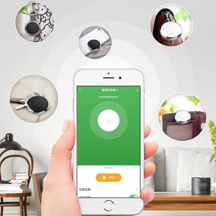 Keychain Tracker for Locating Lost Items with Bidirectional Alarm showing phone app and round tracker attached to keys and bag