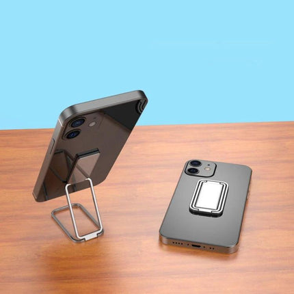 Square Folding Metal Ring Holder for Desktop Phones in Black propping phone on desk with zinc alloy foldable stand for video calls and browsing