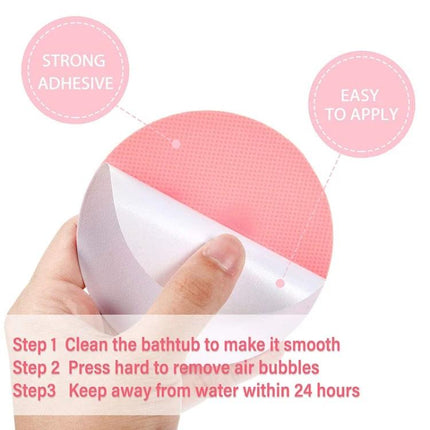 Round Non-Slip Stickers for Everyday Bathroom Safety - pink round PEVA non-slip sticker being peeled, strong adhesive and easy to apply