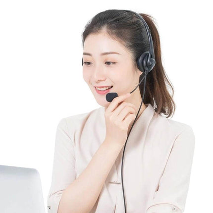 SOYTO Black Double Ear Headset For Online Classes And Meetings worn by smiling woman in video call, noise-reducing mic, lightweight comfort
