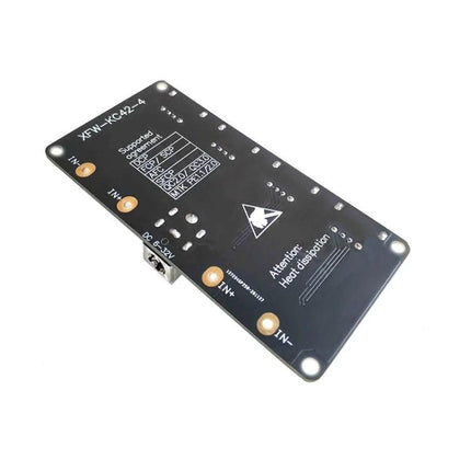 Versatile 4-Way USB Fast Charging Module for Multiple Mobile Devices black PCB board with four QC3.0 ports, travel and desk multi-device charger module