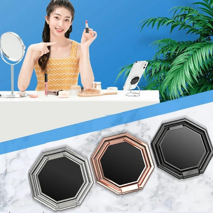 Durable Metal Sticky Ring Holder for Smartphones and Tablets as Stand shown on phone holding device during makeup tutorial