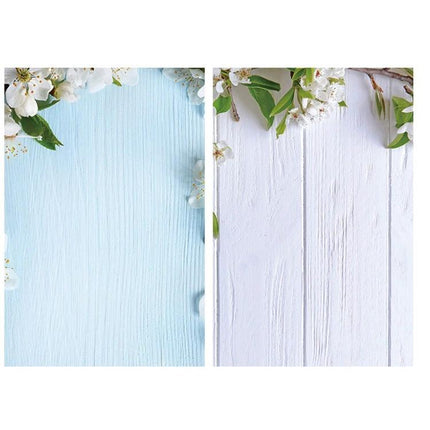 Double-Sided 3D Photography Background Paper for Scenes showing two wood-plank backgrounds (blue and white) with floral accents for product staging
