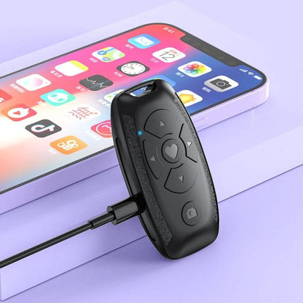 Versatile Car Key Shaped Bluetooth Remote for Selfies and Videos - compact black ABS remote next to smartphone for hands-free photos and video control