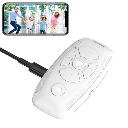 Versatile Car Key Shaped Bluetooth Remote for Selfies and Videos - white compact ABS remote beside smartphone showing family selfie