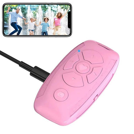 Versatile Car Key Shaped Bluetooth Remote for Selfies and Videos pink ABS key-shaped remote with smartphone showing family selfie