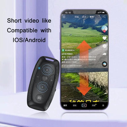 Versatile Car Key Shaped Bluetooth Remote for Selfies and Videos compact ABS remote beside smartphone showing short video controls