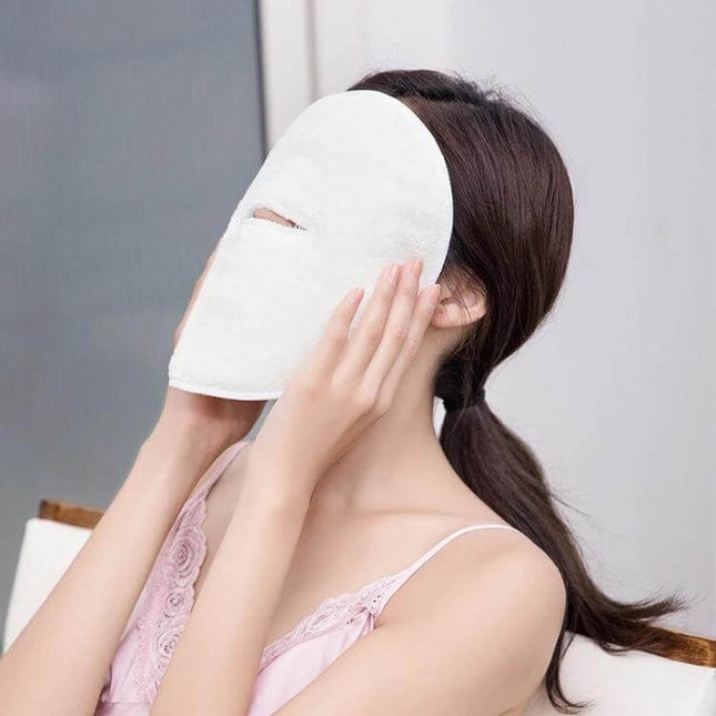 Hot And Cold Compress Facial Mask Towel With Three Holes And Straps on woman demonstrating fit, soft breathable fabric for home spa and salon use
