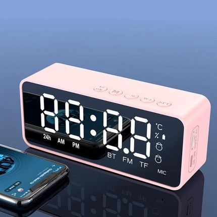 Bedside Mirror Alarm With Clock Display And Bluetooth Speaker compact pink tabletop mirror clock with temperature readout