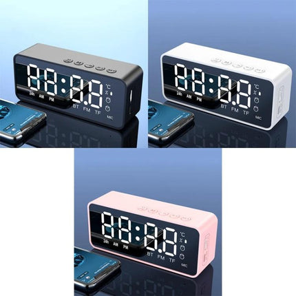 Bedside Mirror Alarm With Clock Display And Bluetooth Speaker on nightstand showing LED time temperature and phone music