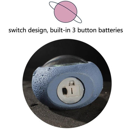 Decorative Resin Planet Night Light for Home Atmosphere showing underside battery compartment and built-in 3-button switch