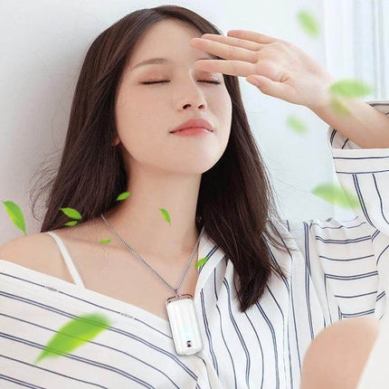 Hanging Neck Negative Ion Air Purifier Portable For Daily Use worn by relaxed woman creating personal clean-air pocket