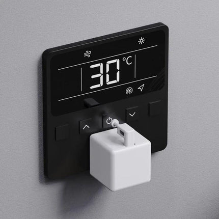 Fingerbot-01 Bluetooth Device for Automated Button Pressing attached to thermostat control demonstrating remote button automation