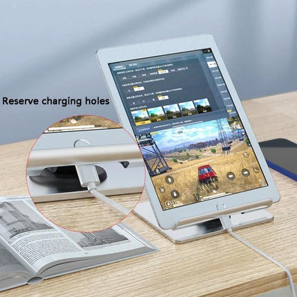 Portable Folding Bracket for Tablets and Laptops with Stable Support on desk holding tablet with charging cable and silicone pads