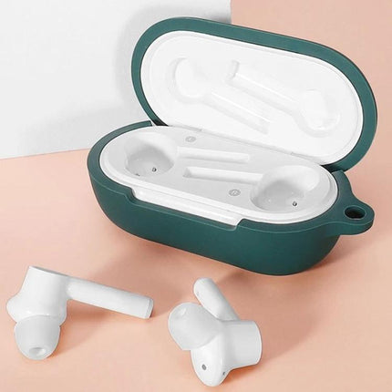 Silicone Case with Hook for Earbuds in Daily Activities — soft green silicone protective case with hook beside white wireless earbuds