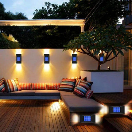 Outdoor Decorative Waterproof Solar Wall Light 6 LEDs Warm Light mounted on exterior wall and stairs providing warm pathway and deck illumination