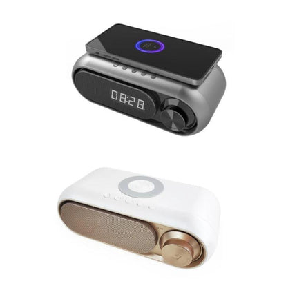 Compact Bluetooth Speaker With LED Clock And USB Charger on desk with digital time display and phone charging