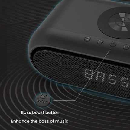 Compact Bluetooth Speaker With LED Clock And USB Charger on desk showing LED time, bass boost button and Bluetooth connectivity
