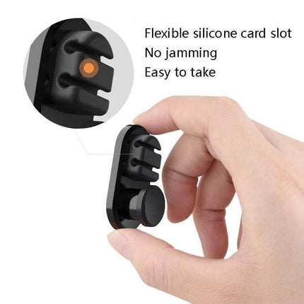 3-Pack Car Sticky Storage Data Cable Hook For Home And Car - hand holding black silicone cable hook with flexible slots for earphones and data cables