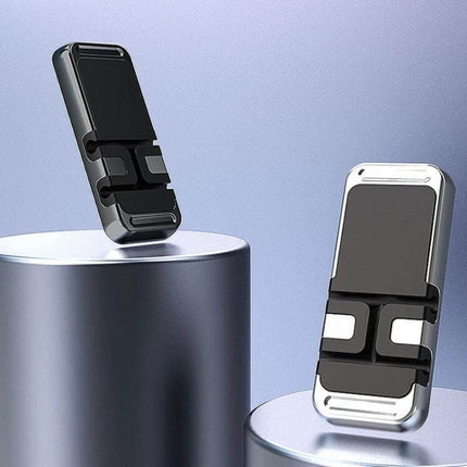 S15 Magnetic Aluminum Alloy Bracket Car Cable Storage Holder neatly attached to dashboard with magnet and silicone contact for organized charging cables