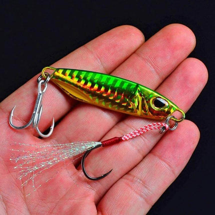 Lead Fishing Lure 40g Reflective Iron Plate For Night Fishing - green holographic jig with treble and single hook held in hand
