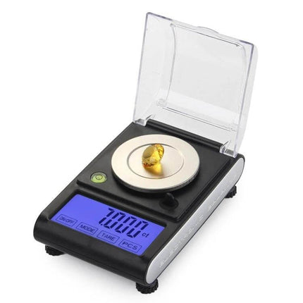Diamond Carat Jewelry Scale for Accurate Home Weighing with gemstone on stainless steel pan, 50g x 0.001g precision and LCD display