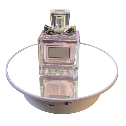 20cm Two-Way Turntable Stand for Product Display and Video Shooting showing perfume bottle on rotating mirrored platform