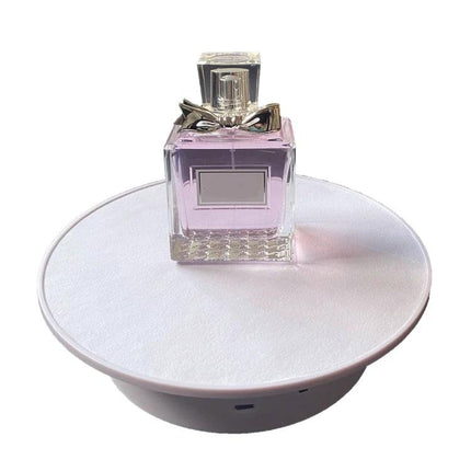 20cm Two-Way Turntable Stand for Product Display and Video Shooting showing perfume bottle centered on rotating platform for 360° product photography