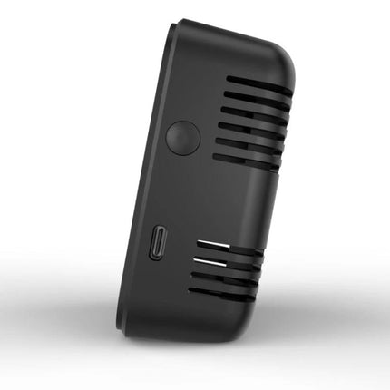 Indoor Air Quality Monitor with Temperature and Humidity Detection — compact black side view showing vents, power button, and USB‑C port for home or office use
