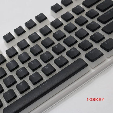 Translucent Double-Layer PBT Keycaps for Mechanical Keyboards on a 108-key white keyboard with black legends, durable textured typing set