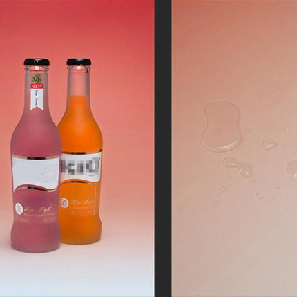 Gradient Morandi Double-Sided Photography Background Paper, 54x83cm showing two beverage bottles on soft layered gradient backdrop