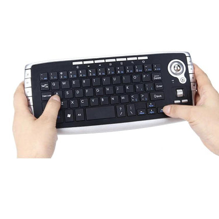 Compact Wireless Trackball Keyboard and Mouse Set for Computing shown held in hands with built-in trackball and compact layout